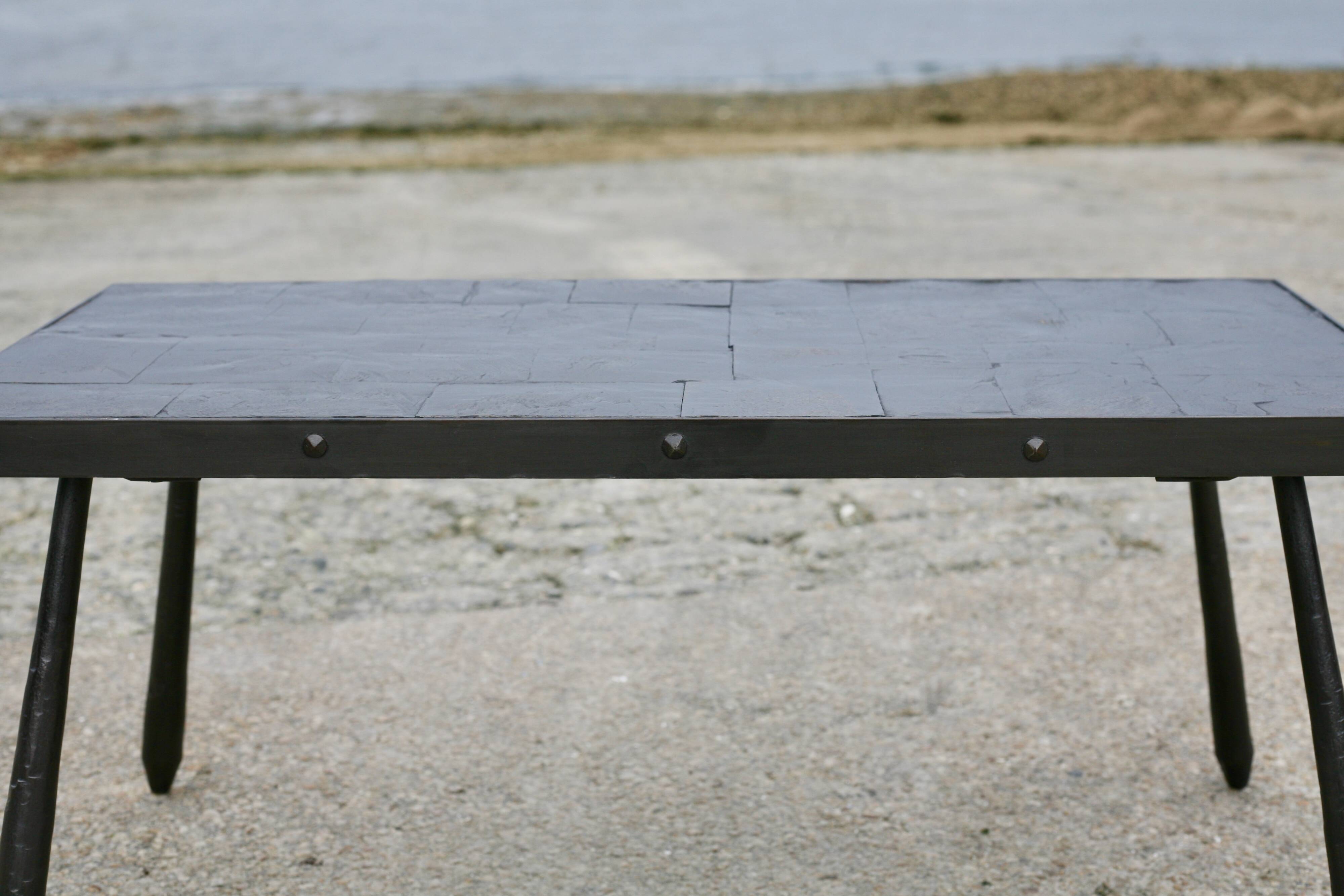 Brutalist coffee table, slate top and steel base, France, 1960s