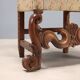 Pair of antique Baroque armchairs in walnut and fabric, Italy, 17th century.