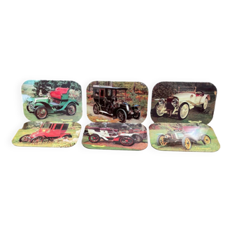 6 sets de table vintage avec différentes voitures anciennes