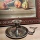 Silver metal thumb candle holder