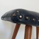 Dark blue leather stool with studs