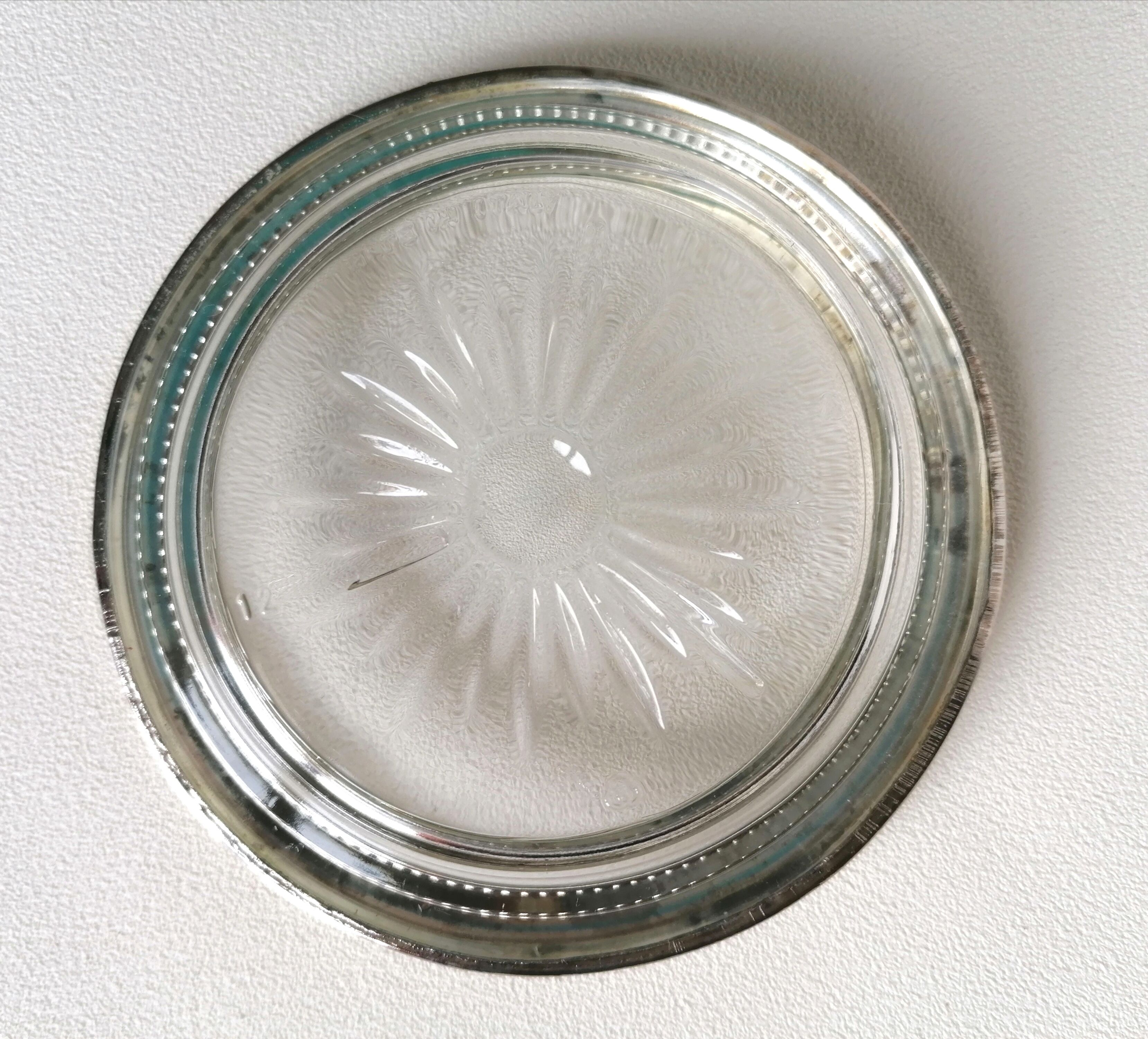 Three under silver-plated bottles