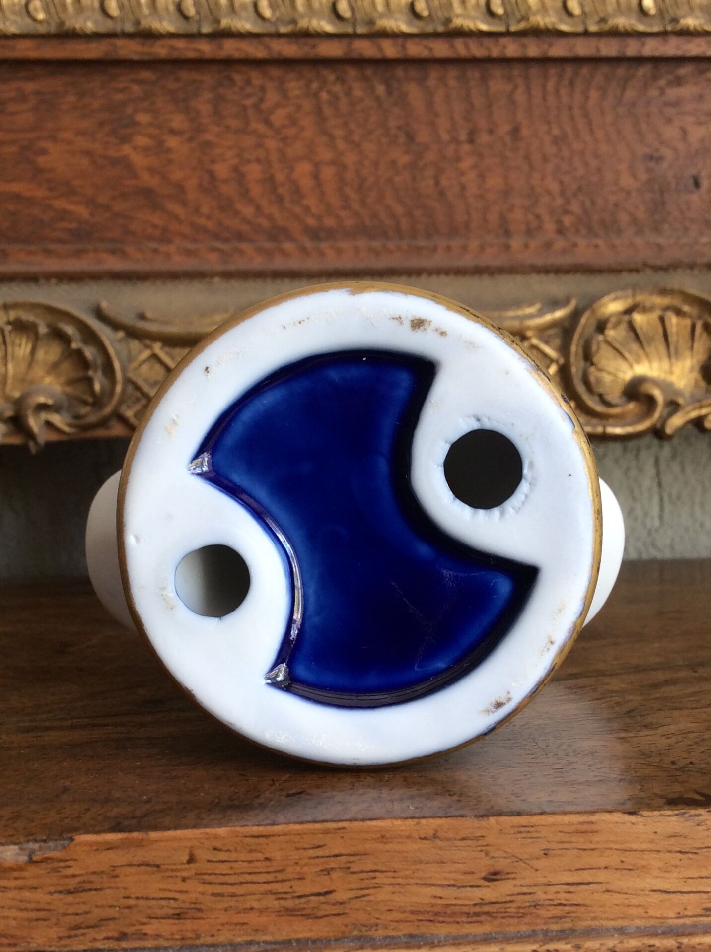 Small biscuit bust with blue base