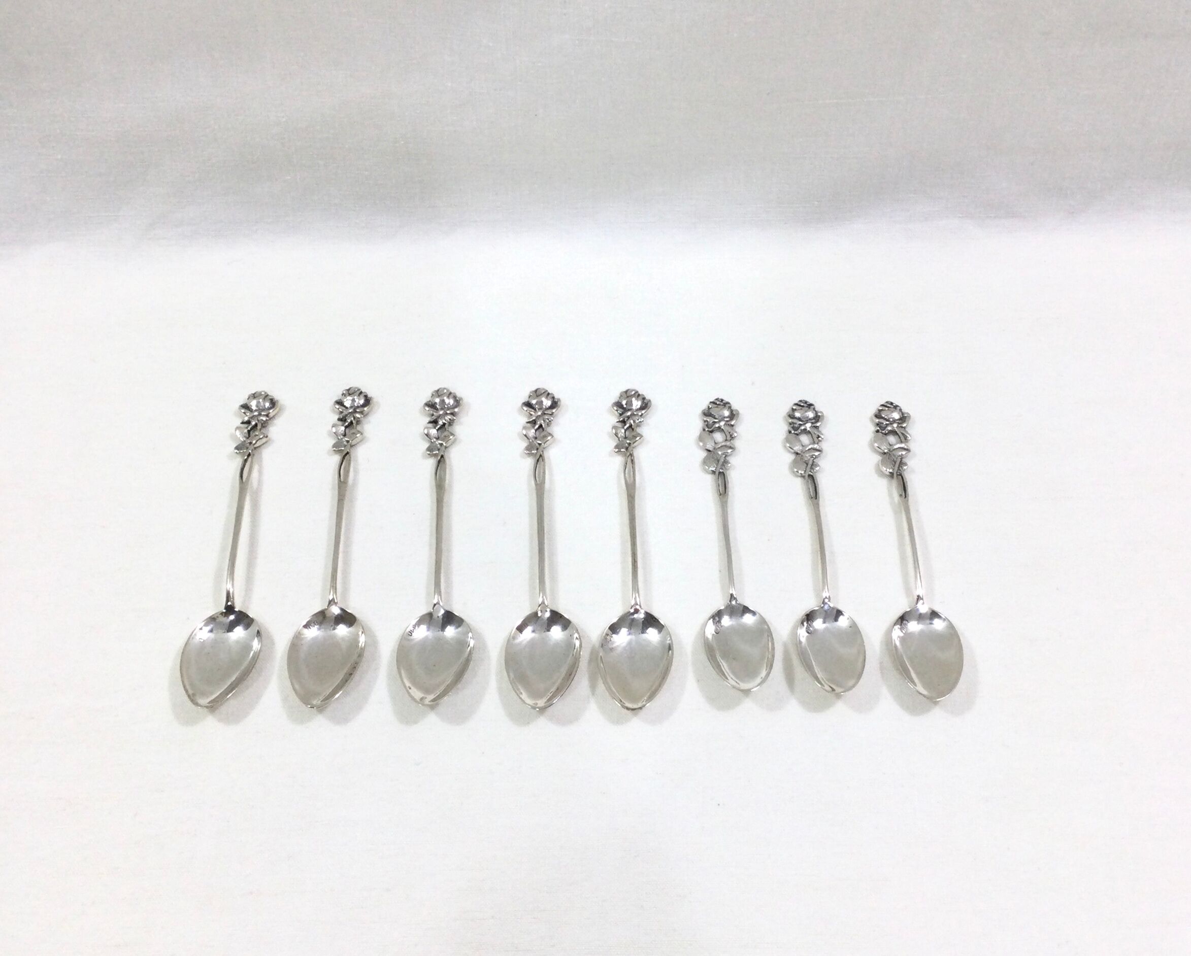 Set of 8 art nouveau silver spoons