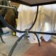 Table cast iron enamelled gold, top marble