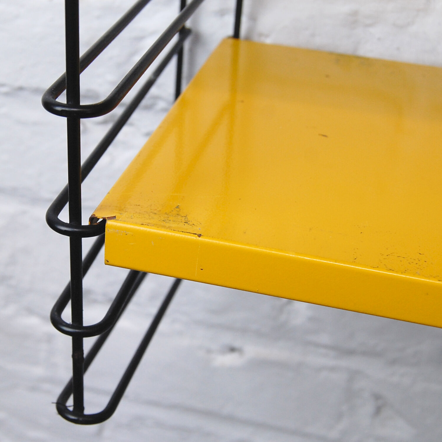 Vintage Tomado wall shelf by A. Dekker 1960s