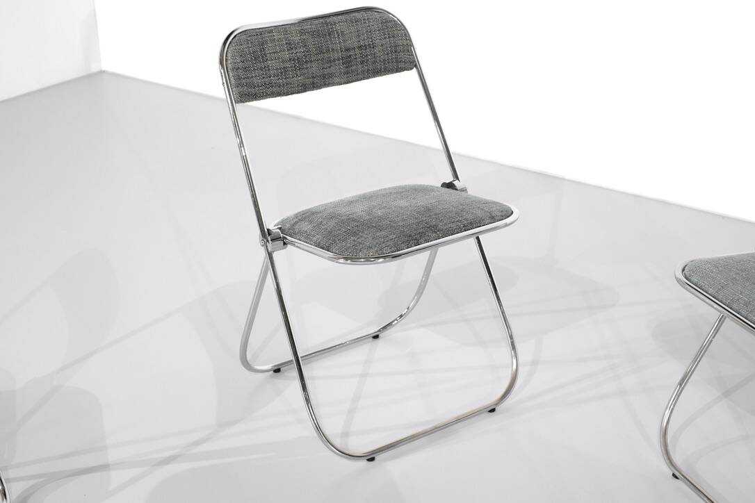 Set of 9 chrome folding chairs with fabric from the 1970s.