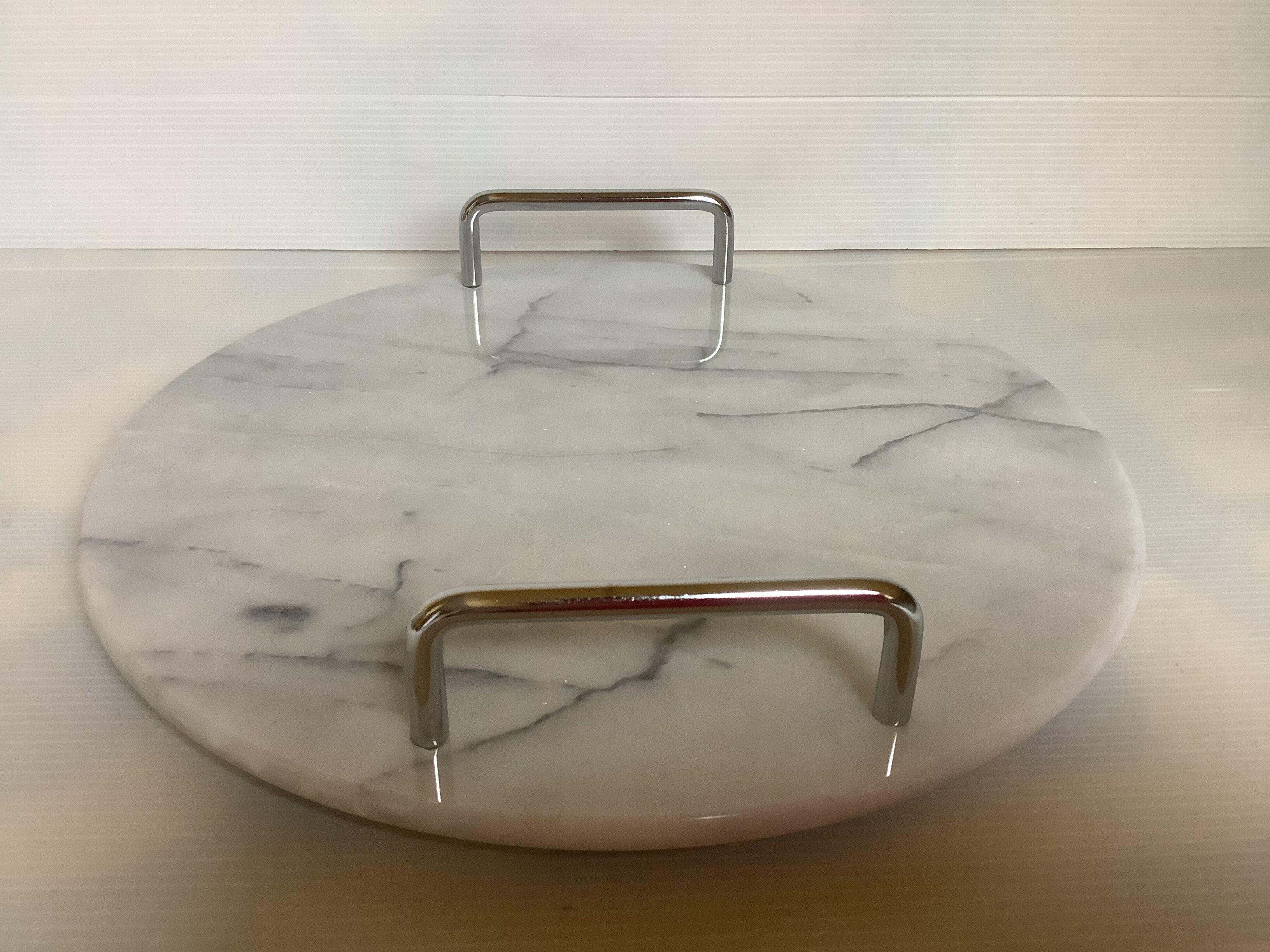 Marble dish with chrome metal handles