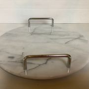 Marble dish with chrome metal handles