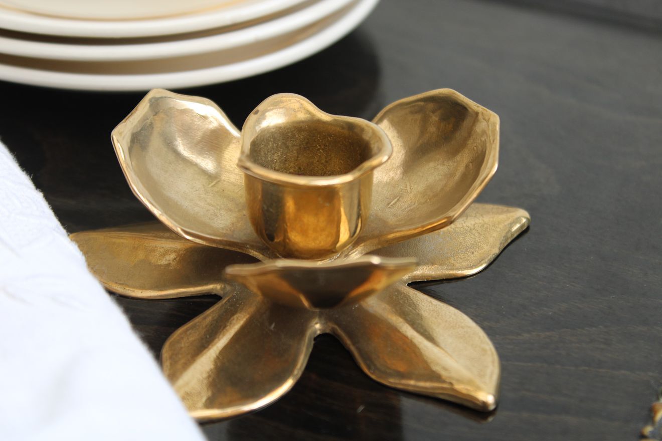 Golden brass candle holder