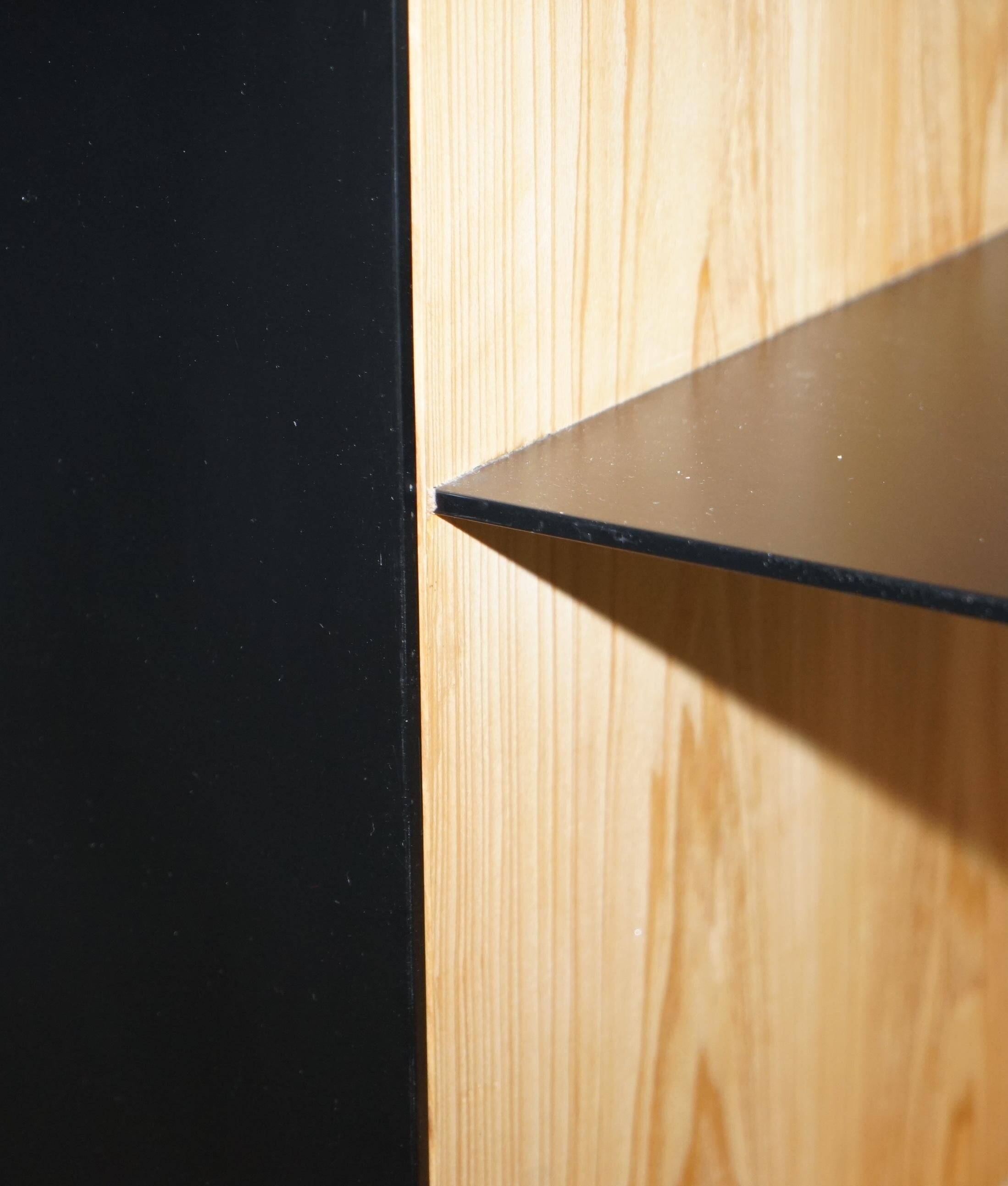 Buffet Ralph Lauren with polished slate stone and rosewood shelves.