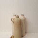 3 sandstone bottles