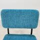 Modernist armchair from the 1950s in vintage blue boucle fabric.
