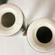 Pair of enamelled ceramic candlesticks