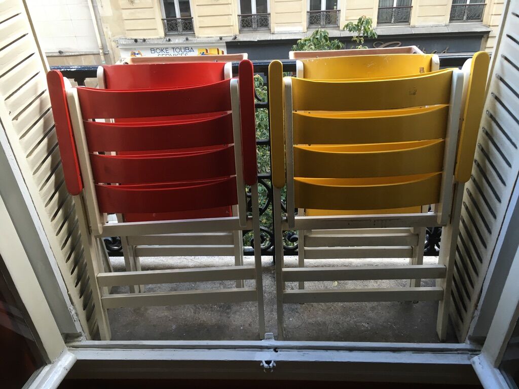 Vintage foldable wooden armchair