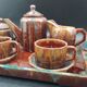 Tête-à-tête coffee service in Puisaye stoneware signed Louis Cagnat, Art Deco