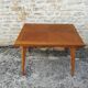 Oak table has two vintage extensions