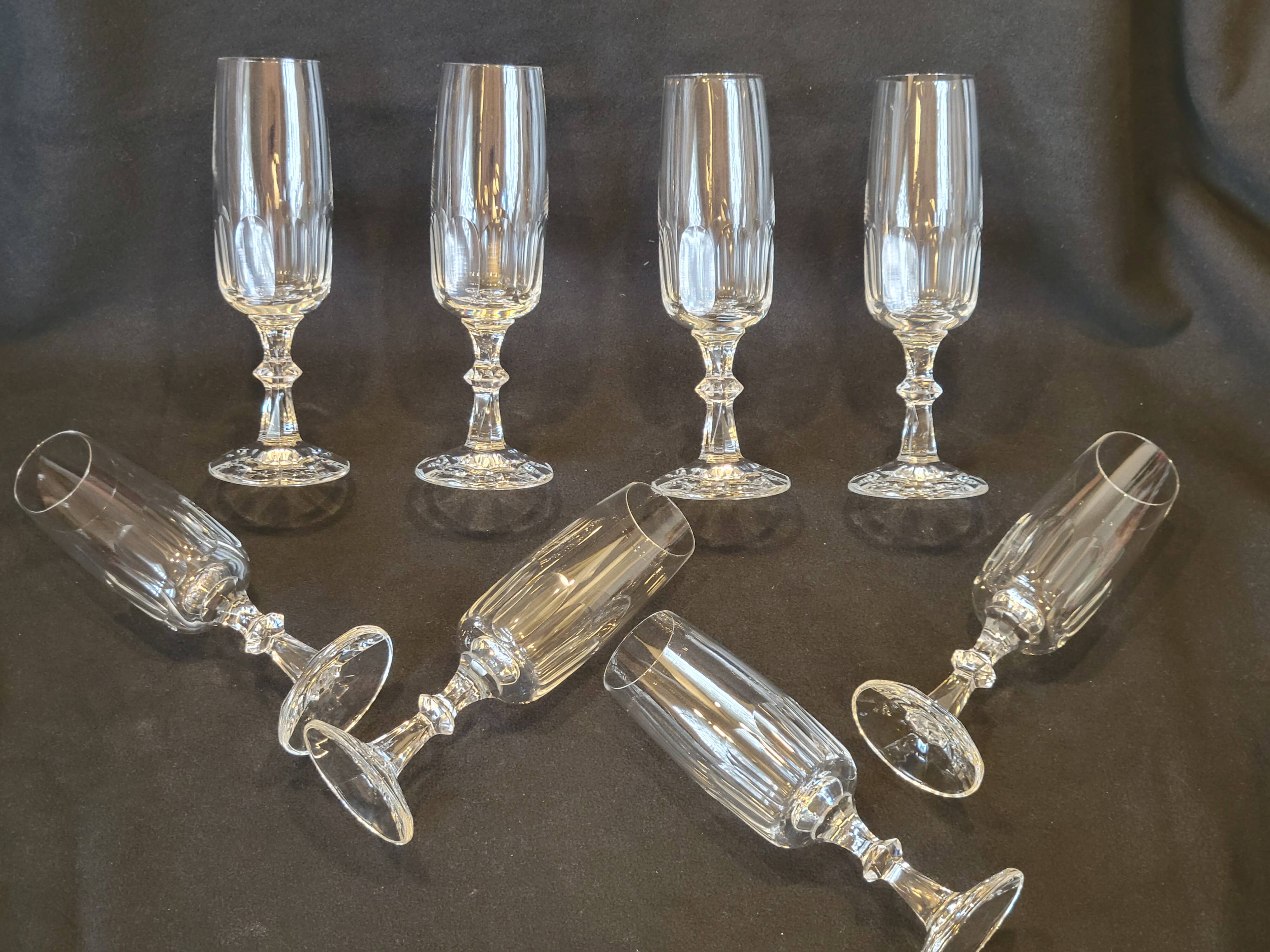 8 champagne flutes in flat cut crystal