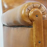 Restored antique Art Deco sheep leather armchair