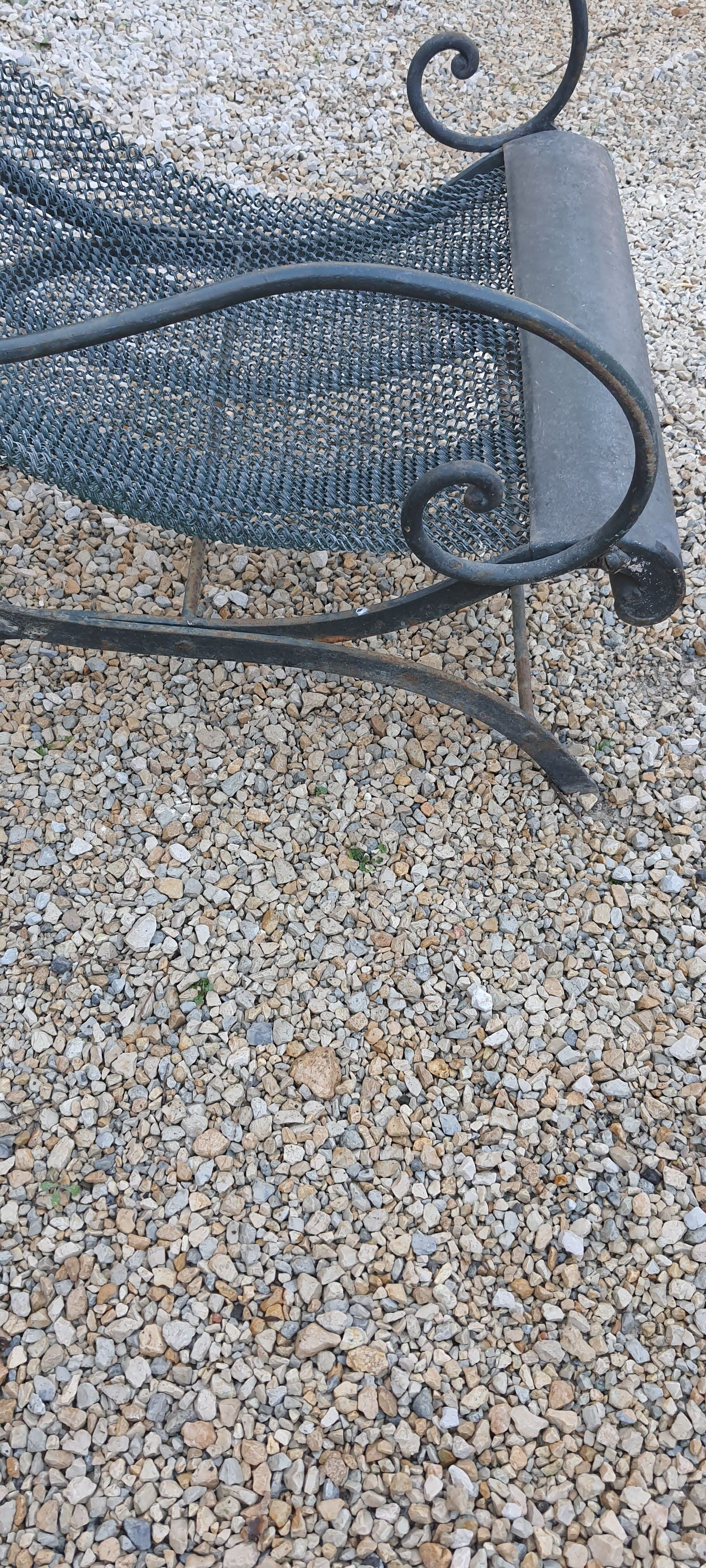 Relaxed wrought iron chair