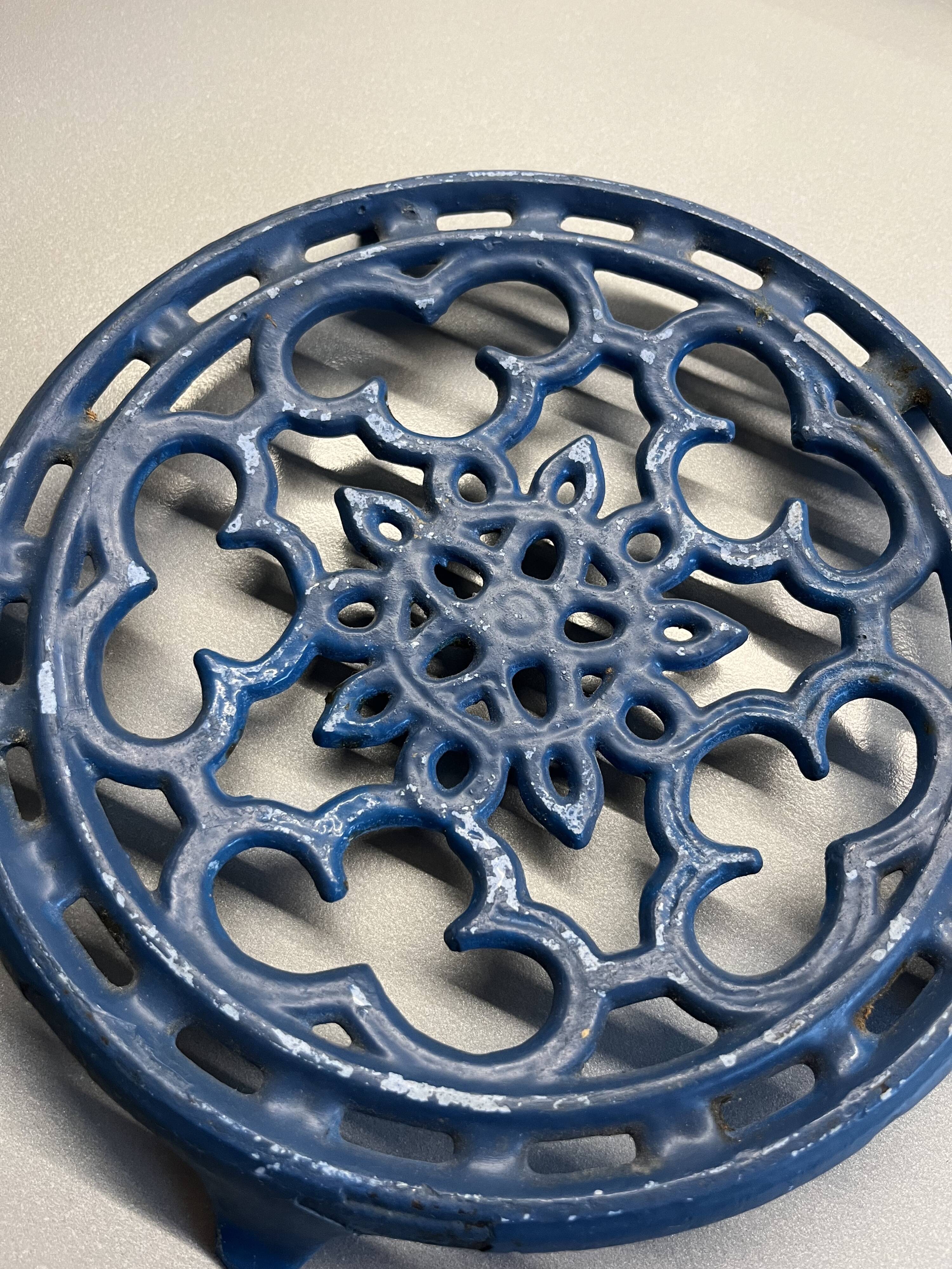 Old blue cast iron trivety
