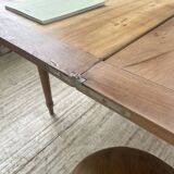 Walnut farmhouse table with swivel and extendable top
