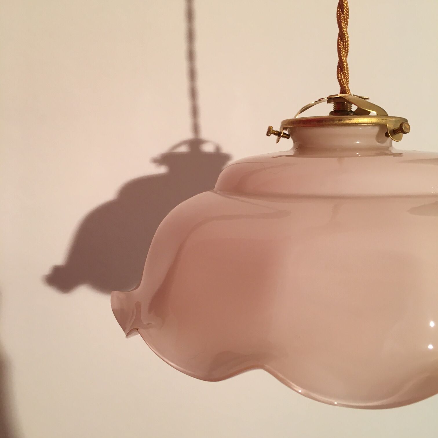 Powder pink opaline hanging and golden woven cord