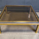 Table basse vintage en chrome et laiton dans le style de Romeo Rega, années 1970.