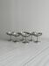 6 coupelles sur pied en inox