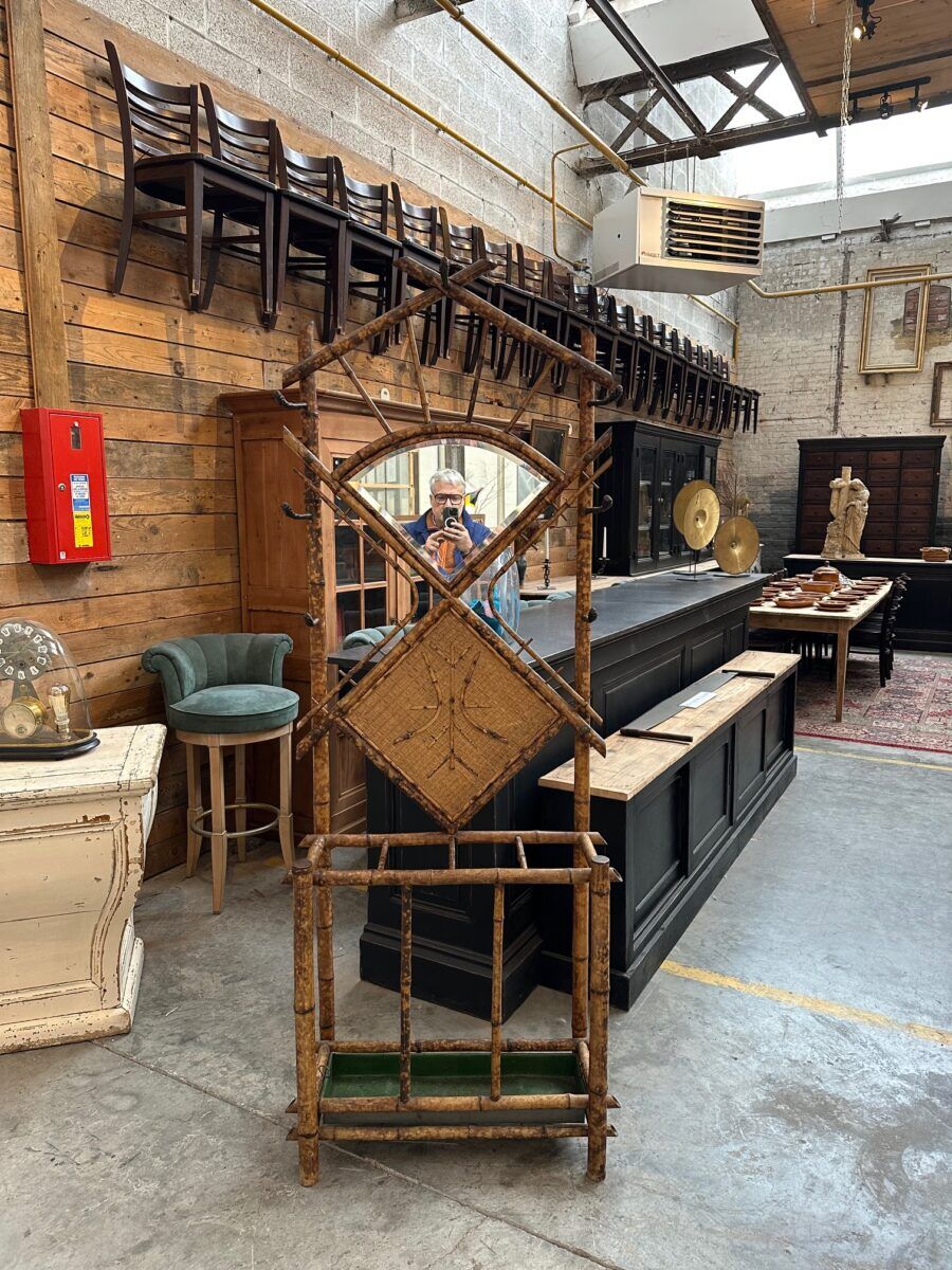 Entrance hall wardrobe in bamboo and rattan from the early 20th century.