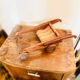 Vintage wooden folding doll's deckchair on wheels