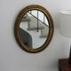 Oval gold mirror in Napoléon III style