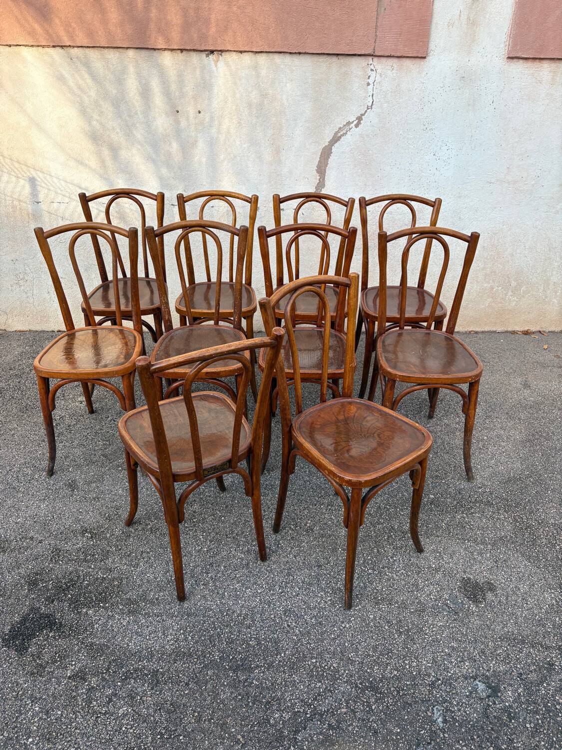 10 varnished patterned bistro chairs