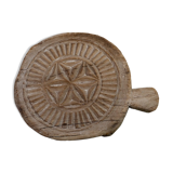 Carved wooden chapatis board