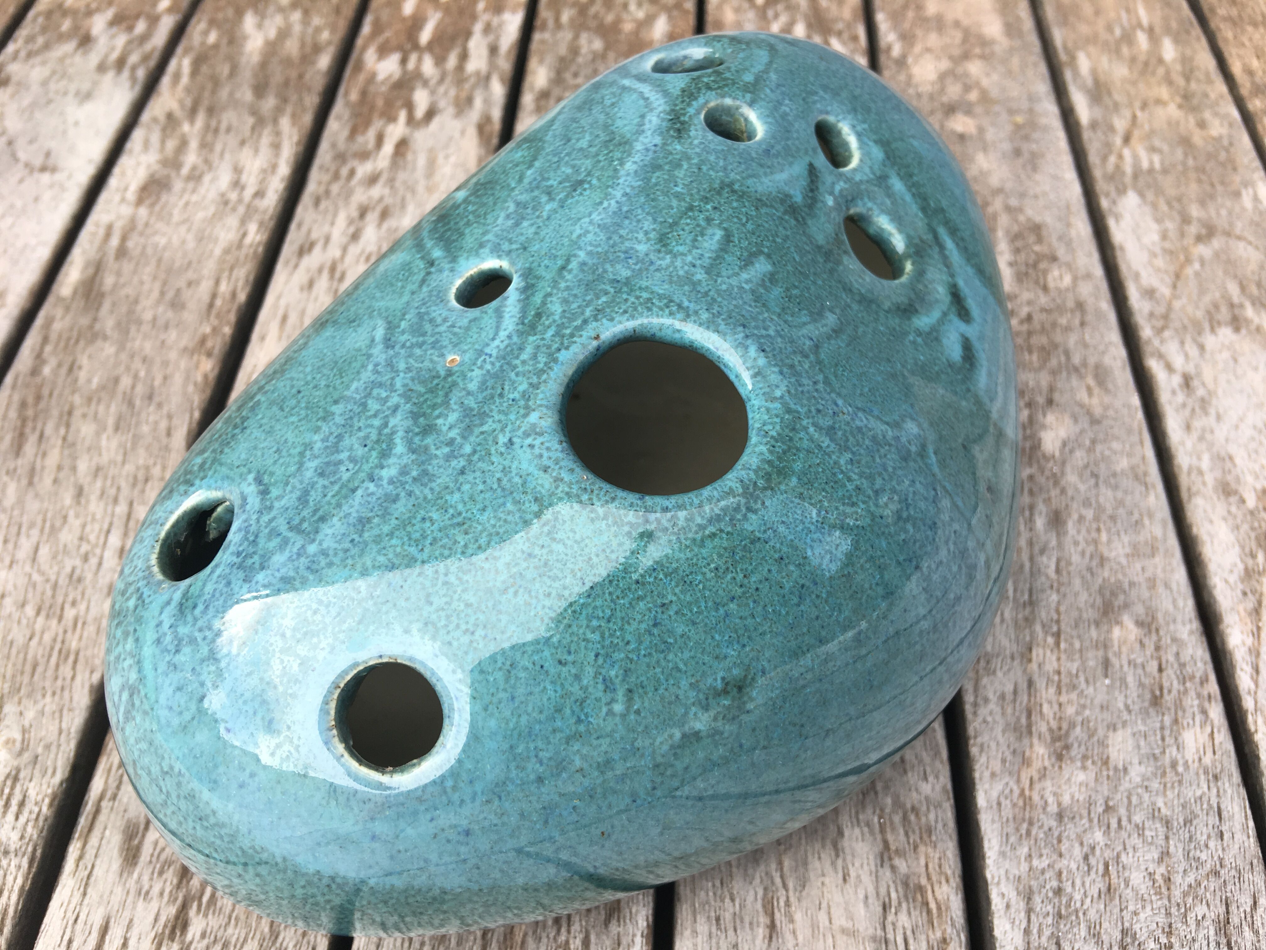 Roller spike flowers, blue-green ceramics