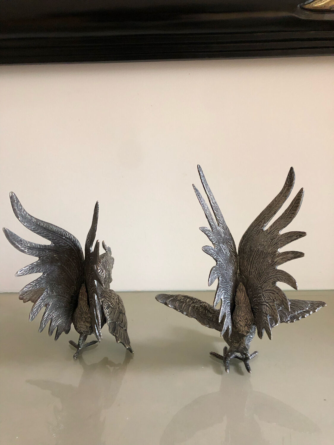 Vintage silver metal roosters