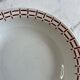 Presentation plate with a brown pattern