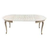 Extendable round table renovated in raw wood