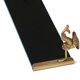 Wall shelf in gold metal and black glass adorned with fish.