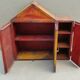 Old atypical metal workshop furniture with its original red patina