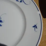 Fine Limoges porcelain dessert service: dish and 12 plates.