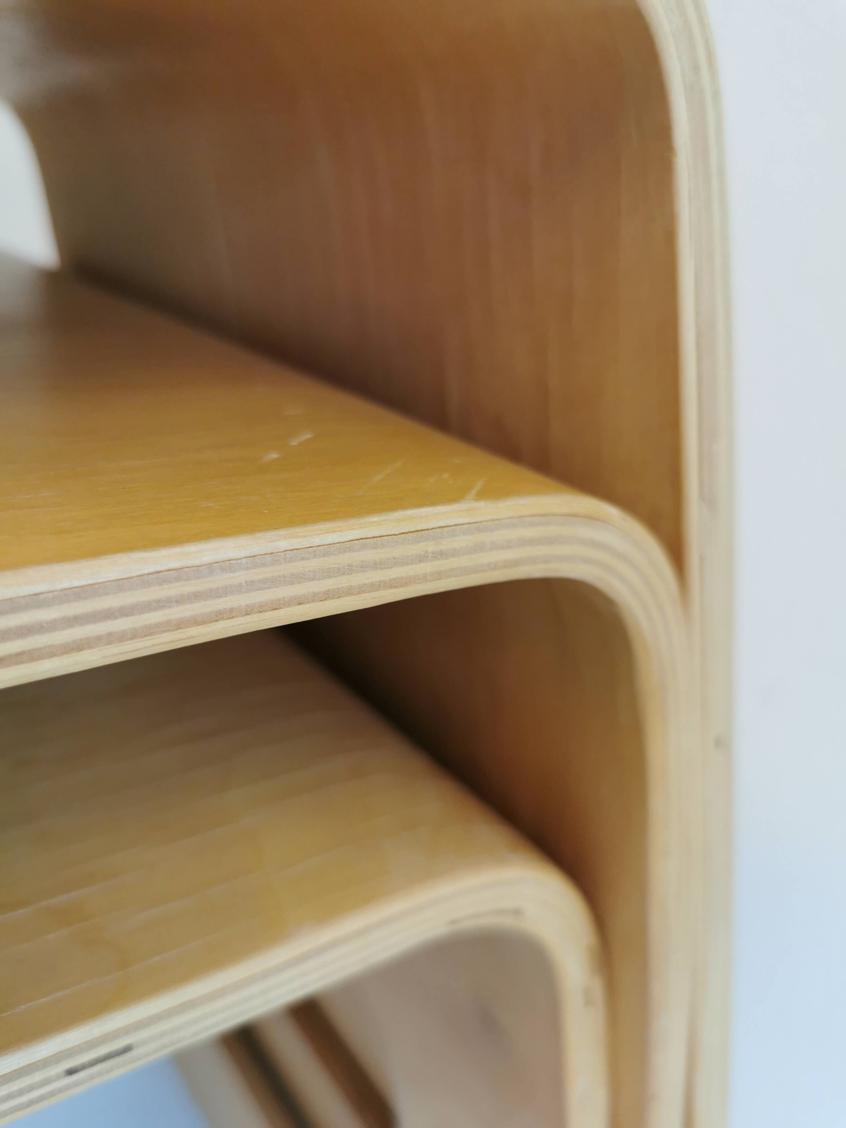 Design stool/side table made of curved plywood.