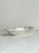 Shallow dish in silver-plated metal