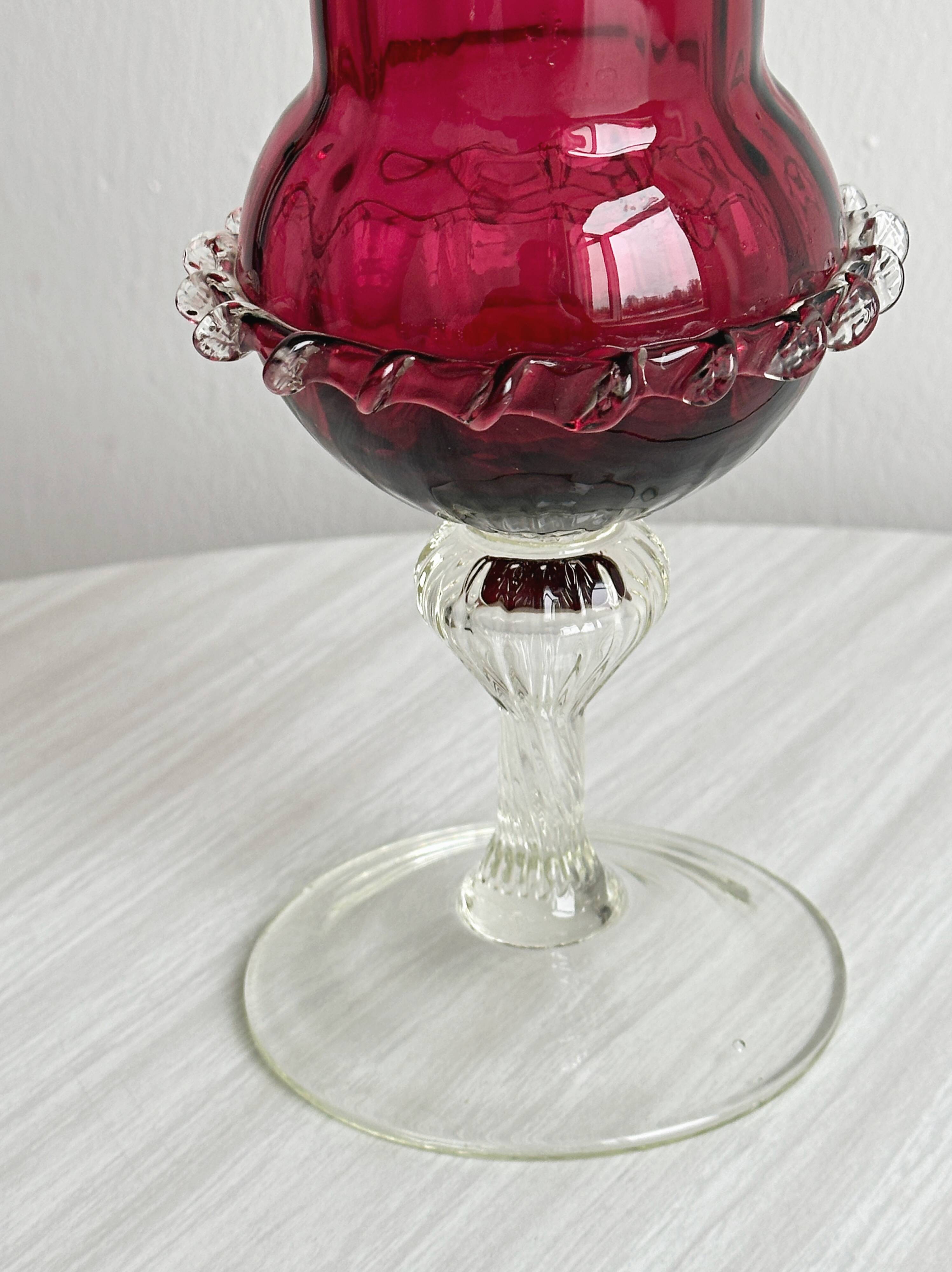 Translucent glass vase on a stand