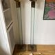 Pair of large glass and brass floor lamps in the 70s
