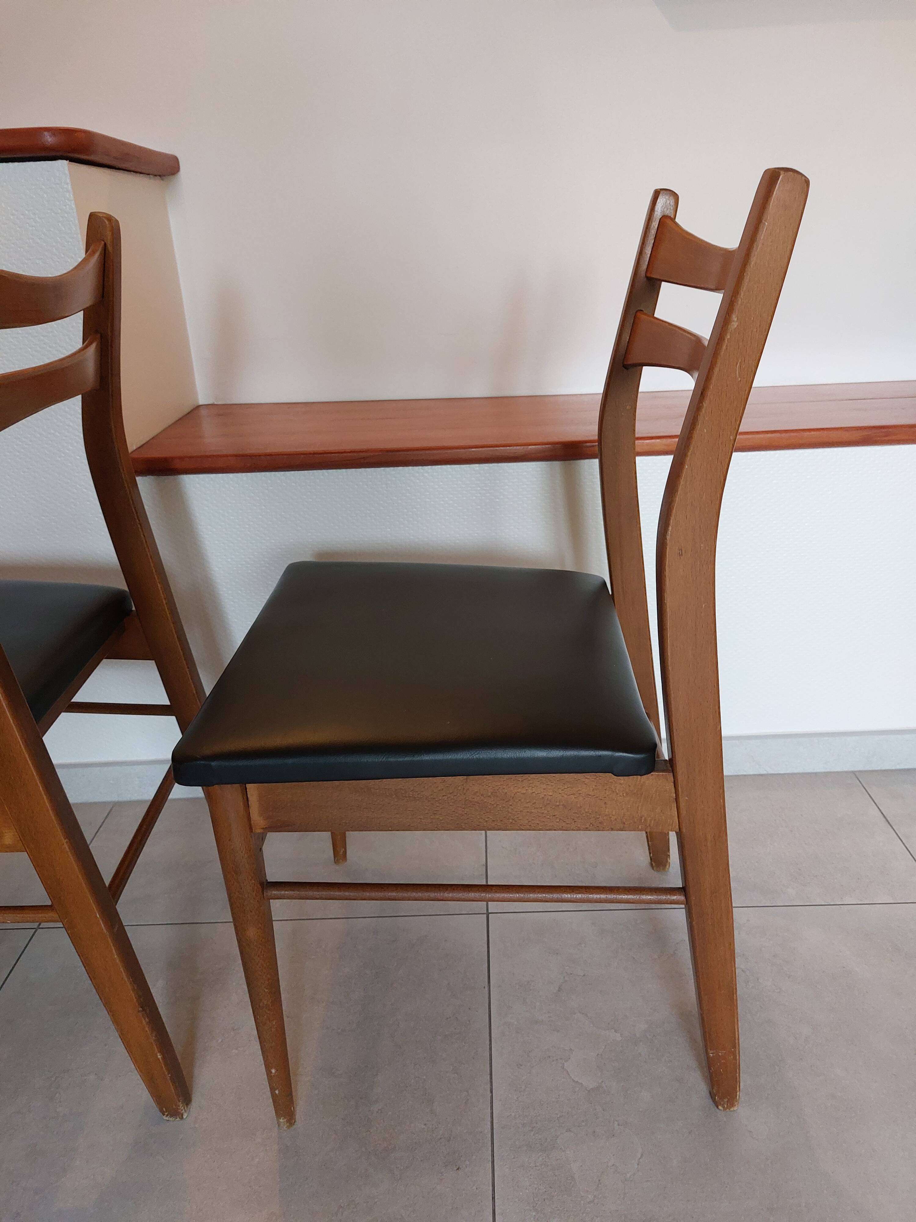 5 Scandinavian style chairs, wood and black faux leather.