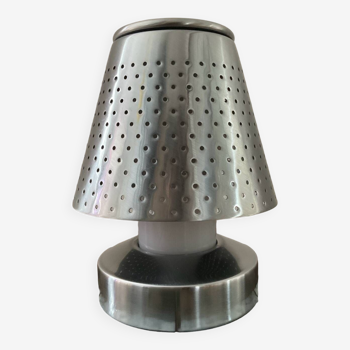 Designer lamp in perforated stainless steel