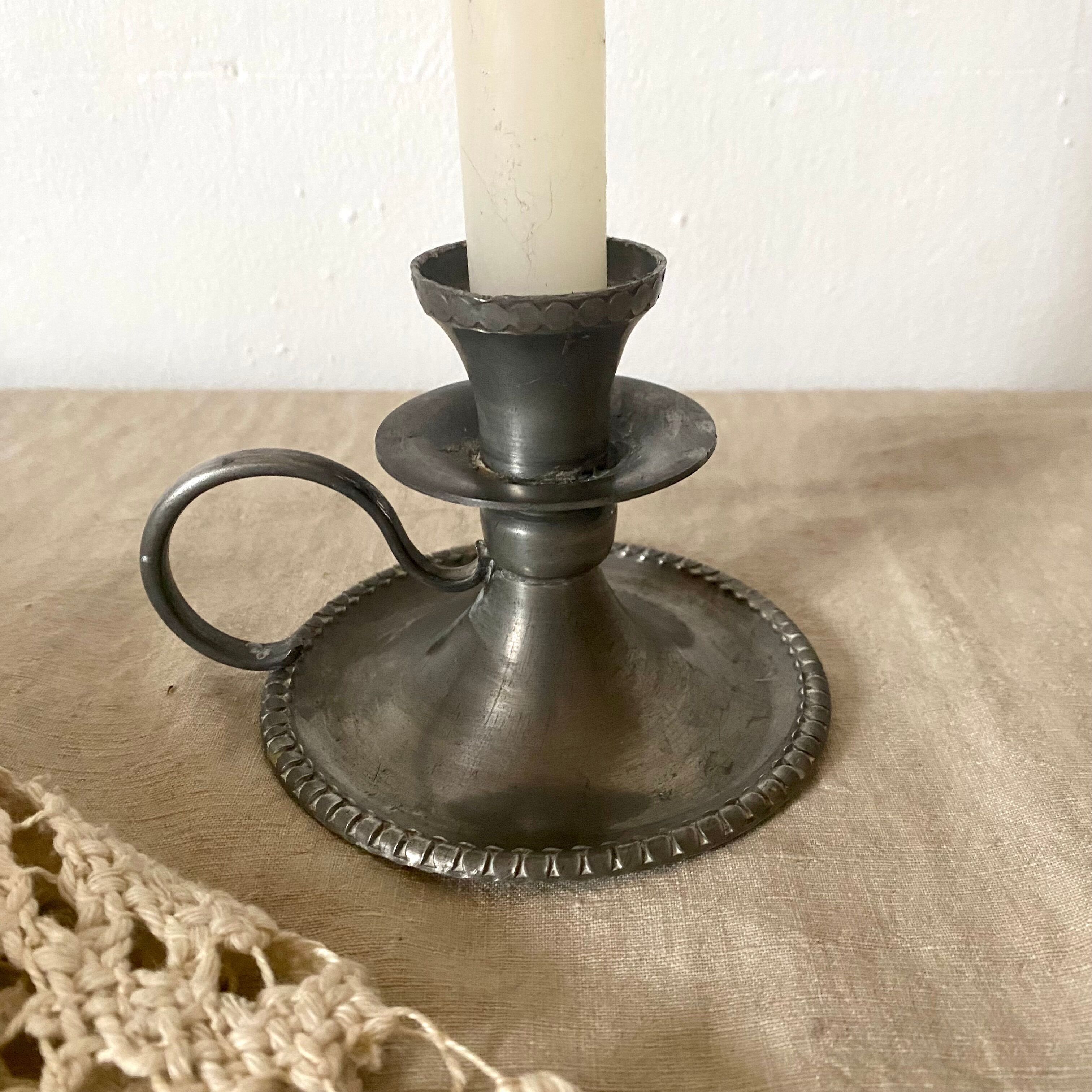 Tin thumb candle holder