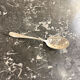 Openwork serving spoon, silver metal