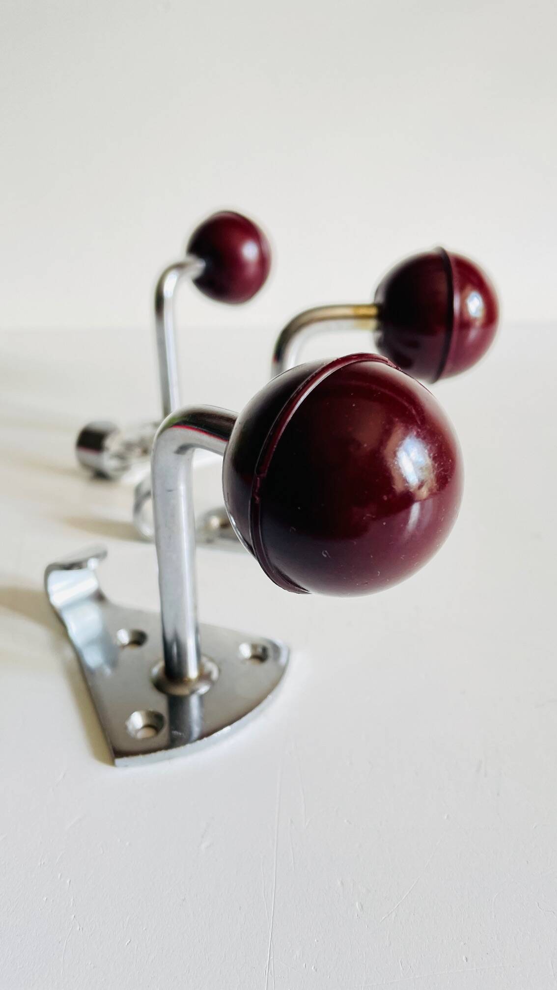 Chrome and bakelite coat hooks from the 70s
